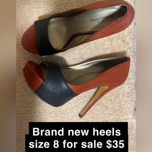 Brand new never worn Michael Antonio Pumps size 8